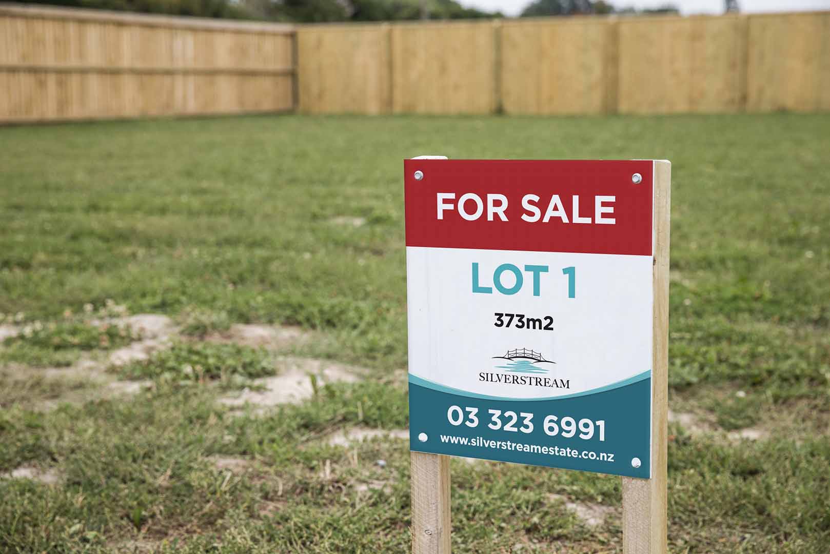 Lot for sale sign on empty Silverstream lot